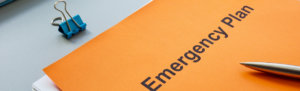 A folder that states Emergency Plan