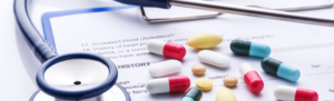 Image of medications and a stethoscope